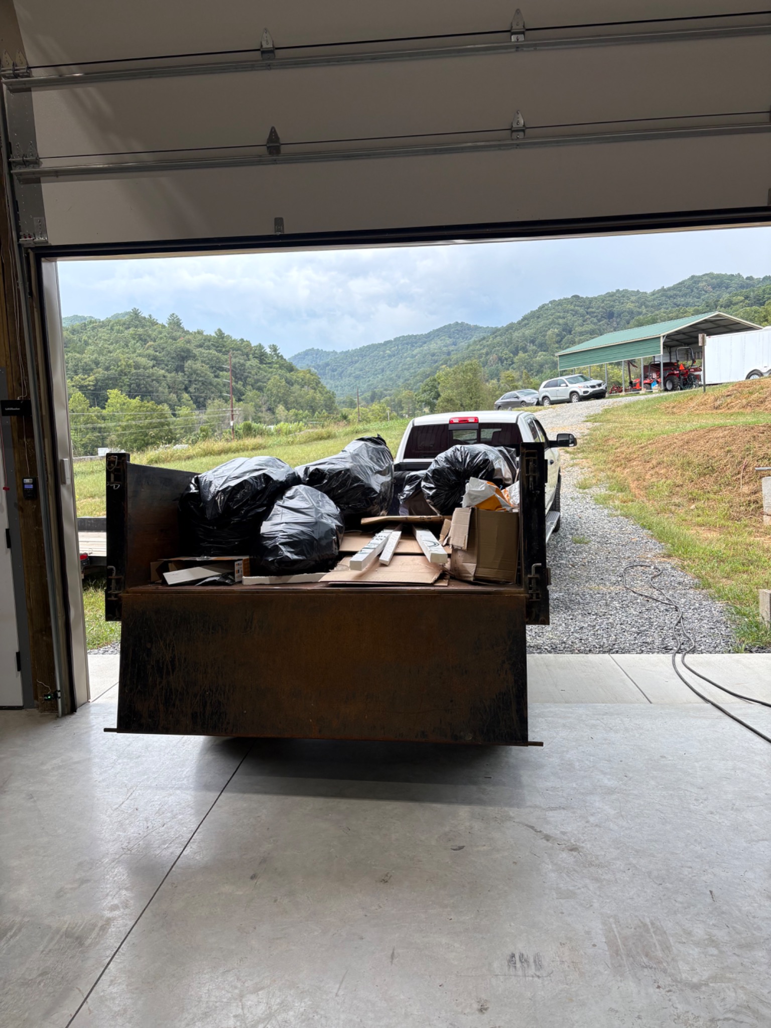 Junk removal trailer loaded for hauling